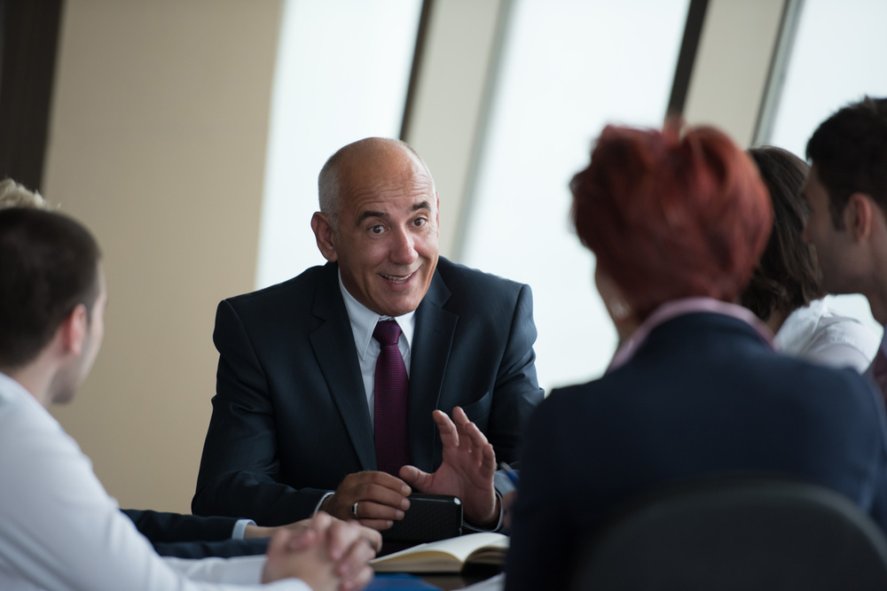 startup business people group have meeting in modern bright office interior, senoir investors and young software developers startup business people group have meeting in modern bright office interior, senoir investors and young software developers